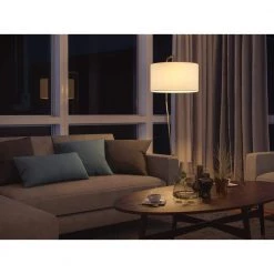 Enoch 60.5 in. Antique Brass Tripod Arc Floor Lamp by Manor Brook -Brightech Sales antique brass manor brook floor lamps mb100262 fa 1000