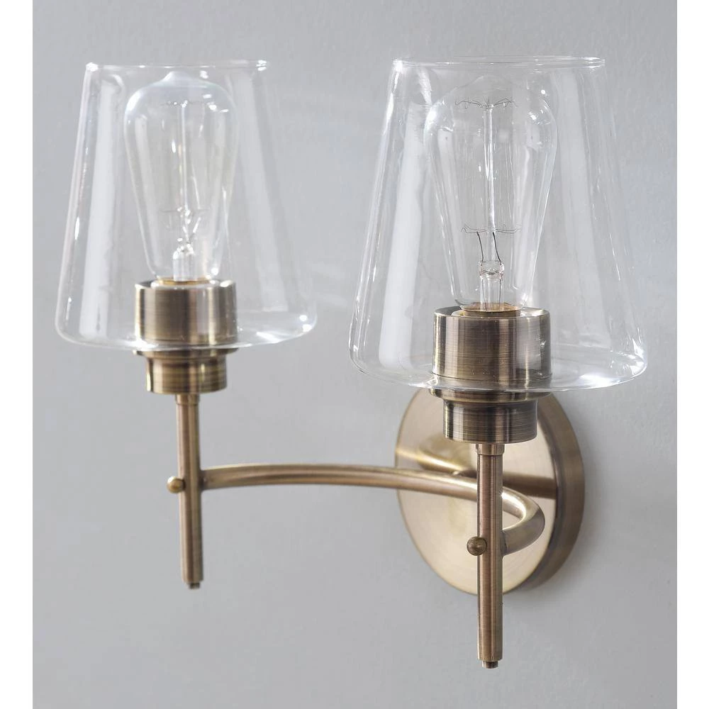 Martin 14 in. 2-Light Antique Brass Vanity Light with Clear Glass Shades by Manor Brook 5 Martin 14 in. 2-Light Antique Brass Vanity Light with Clear Glass Shades by Manor Brook - Image 4