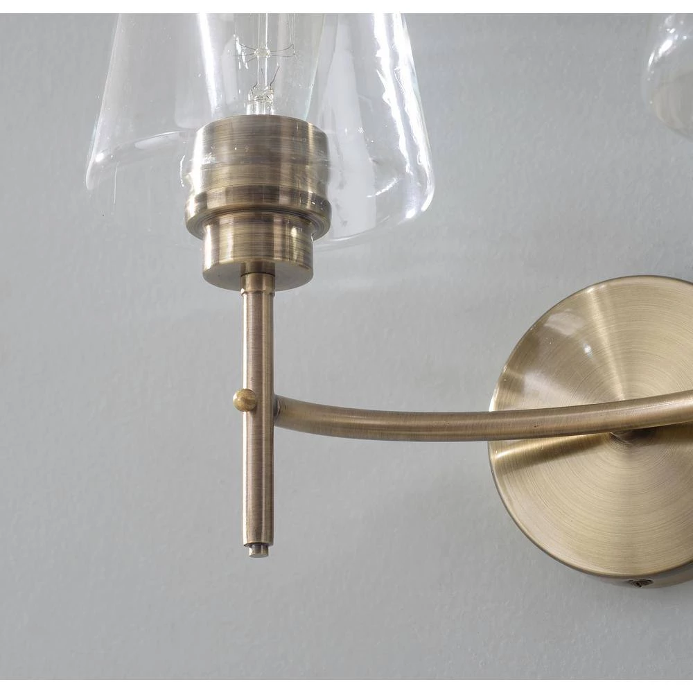 Martin 14 in. 2-Light Antique Brass Vanity Light with Clear Glass Shades by Manor Brook 8 Martin 14 in. 2-Light Antique Brass Vanity Light with Clear Glass Shades by Manor Brook - Image 7