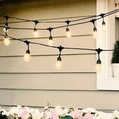 Ambience Pro Outdoor 27 ft. Solar Powered LED 5-Watt S14 Flickering Flame Bulbs Hanging String Lights 2700k by Brightech 8 Ambience Pro Outdoor 27 ft. Solar Powered LED 5-Watt S14 Flickering Flame Bulbs Hanging String Lights 2700k by Brightech -Brightech Sales black brightech string lights slr flmhg 4f 1000