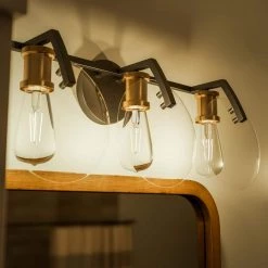 10 in. 3-Light Fisher Round/Oval Black Vanity Light by Manor Brook -Brightech Sales black manor brook vanity lighting mb100682 fa 1000