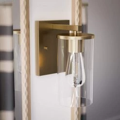 Hipley 10 in. 1-Light Cylinder Brass Wall Sconce by Manor Brook 13 Hipley 10 in. 1-Light Cylinder Brass Wall Sconce by Manor Brook -Brightech Sales brass manor brook wall sconces mb100705 1f 1000