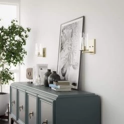 Hipley 10 in. 1-Light Cylinder Brass Wall Sconce by Manor Brook 17 Hipley 10 in. 1-Light Cylinder Brass Wall Sconce by Manor Brook -Brightech Sales brass manor brook wall sconces mb100705 31 1000