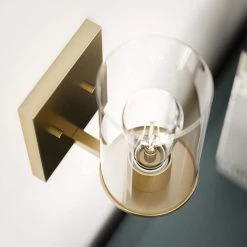 Hipley 10 in. 1-Light Cylinder Brass Wall Sconce by Manor Brook 12 Hipley 10 in. 1-Light Cylinder Brass Wall Sconce by Manor Brook -Brightech Sales brass manor brook wall sconces mb100705 4f 1000