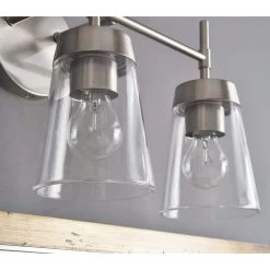 Dunlap 3-Light Brushed Steel Vanity by Manor Brook -Brightech Sales brushed steel manor brook vanity lighting mb100379 4f 1000