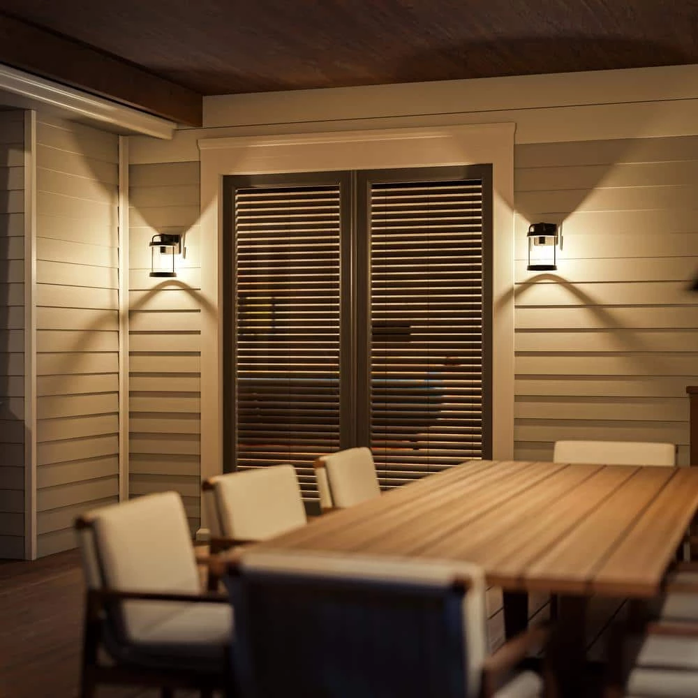 Stockmeade 10 in. 1-Light Black Outdoor Small Cylinder Lantern Wall Sconce by Manor Brook 5 Stockmeade 10 in. 1-Light Black Outdoor Small Cylinder Lantern Wall Sconce by Manor Brook - Image 4