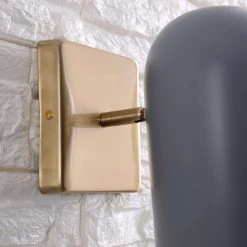 Hattie 1-Light Gray and Antique Brass LED Wall Sconce by Manor Brook -Brightech Sales gray and antique brass manor brook wall sconces mb100622 4f 1000