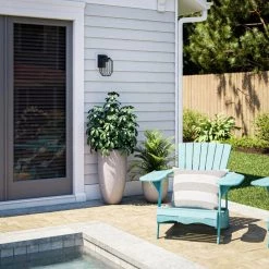 Bow 1-Light Black Outdoor Lantern by Manor Brook 15 Bow 1-Light Black Outdoor Lantern by Manor Brook -Brightech Sales matte black manor brook outdoor sconces mb100543 44 1000