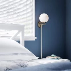 Adella 1-Light White with Antique Brass Wallchiere by Manor Brook -Brightech Sales white with antique brass manor brook wall sconces mb100609 1f 1000