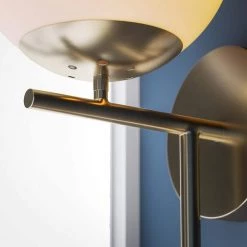 Adella 1-Light White with Antique Brass Wallchiere by Manor Brook -Brightech Sales white with antique brass manor brook wall sconces mb100609 31 1000