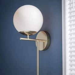 Adella 1-Light White with Antique Brass Wallchiere by Manor Brook -Brightech Sales white with antique brass manor brook wall sconces mb100609 44 1000