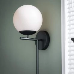 Adella 1-Light White with Matte Black Wallchiere by Manor Brook 15 Adella 1-Light White with Matte Black Wallchiere by Manor Brook -Brightech Sales white with matte black manor brook wall sconces mb100608 fa 1000